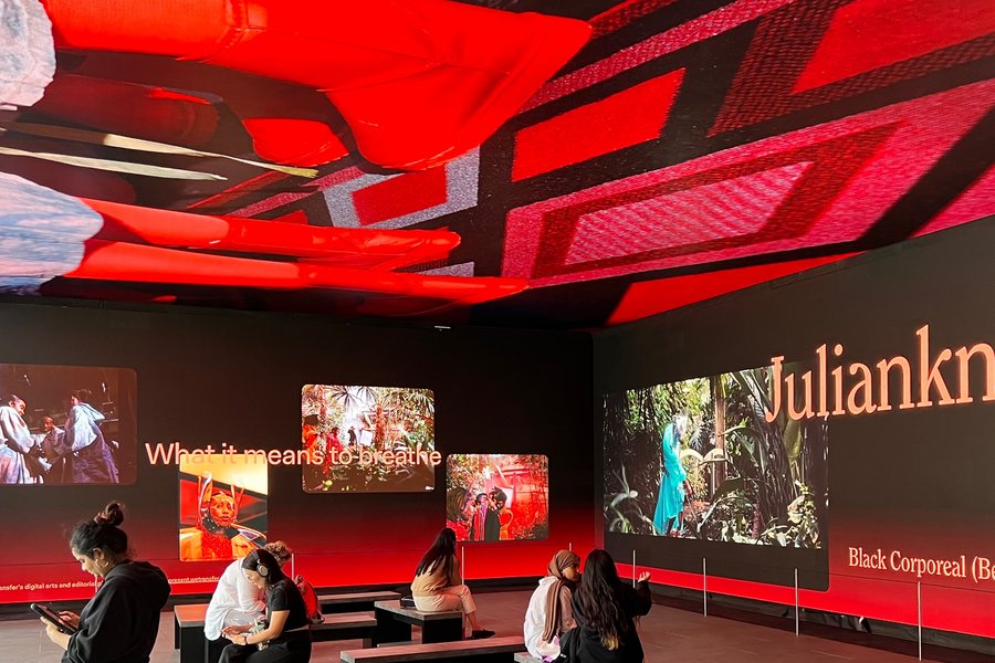 Art-Installation-Outernet.jpg Visitors viewing an immersive video installation in a modern exhibition space.